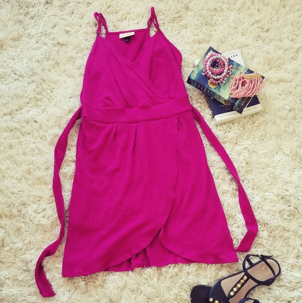 Magenta dress fits small or medium. Never worn.